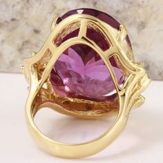 25.25 Carats Natural Amethyst and Diamond 14K Solid Yellow Gold Ring Suggested Replacement Value: $5,900.00 Total Natural Oval Shaped Amethyst Weights: 25.00 Carats (VVS) Amethyst Measures: 22.64 x 16.16mm Natural Round Diamonds Weight: .25 Carats (color G / Clarity VS2-SI1) Ring total weight: 15.2 grams Disclaimer: all weights, measurements and colors are approximate and may vary slightly from the listed dimensions or as seen in the image. All pictures are magnified to show the smallest of deta Formal Purple Sapphire Ring With Gemstone Accents, Luxury Gold Gemstones For Wedding, Luxury Amethyst Ring For Anniversary, Elegant Purple Ruby Ring With Accent Stones, Purple Ruby Ring For Formal Occasions, Luxury Purple Sapphire Wedding Ring, Luxury Amethyst Ring For Wedding With Polished Finish, Luxury Polished Amethyst Ring For Wedding, Exquisite Amethyst Anniversary Ring