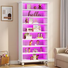 a white bookcase with pink lights in a living room