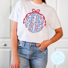 Unleash your wild side with our Red, White and Blue Leopard Monogram Tee! Featuring a playful mix of colors and patterns, this women's tee is perfect for adding a touch of fun to any outfit. Plus, with a monogram and bow detail, you can show off your individual style. Tees run true to size. If you have any questions please feel free to ask. Fabric & Care:Machine wash warm or cold with mild detergentDry on normal dryer settingsDo not dry cleanDo not iron over design. If ironing is needed iron on Trendy Cotton Tops With Monogram Print, Summer Monogram Print Tops, Spring Casual T-shirt With Monogram Print, Casual Monogram Print T-shirt For Summer, Relaxed Fit Monogram Print Summer Tops, Casual Monogram Print T-shirt For Spring, Spring Cotton Monogram Print Tops, Spring Cotton Tops With Monogram Print, Casual Tops With Monogram Print For Spring