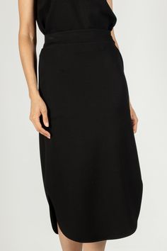 This sophisticated black scuba material midi skirt is great for work place attire of meetings on the go! Features side pockets and side slits. Model wearing size SM. Work Place, Cowl Neck Top, Midi Length Skirts, Black Midi Skirt, Quiet Luxury, Black Midi, Tiger Print, Red Plaid, Midi Length