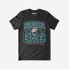 Tired of having to answer questions like, “Who’s your favorite team?” Here’s a shirt that will answer them for you. Show off your fandom and celebrate your team’s decades-spanning awesomeness with the Philadelphia Eagles Established Banner T-Shirt. This top features a design that showcases your all-important team colors and a bold team logo display across the chest, meaning this tshirt will prove your unmatched dedication to the Philadelphia Eagles when you’re at the game or watching at home wit Philadelphia Eagles Colors, Philadelphia Eagles Shirts, Eagles Shirt, Midnight Green, Logo Display, Team T Shirts, Team Shirts, Philadelphia Eagles, Team Names