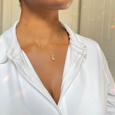 Inspired by Venus, the goddess of beauty, the VENUS Necklace serves as a beautiful reminder of femininity and self-love. Its minimalist design showcases a gold-dipped stainless steel female form gracefully suspended on a classic chain, making it a perfect accessory for any occasion. Key Features: - Timeless Design: The elegant yet understated aesthetic allows you to wear it alone for a sophisticated look or layer it with other pieces for a trendy vibe.- Durable and Long-Lasting: Crafted from hig 14k Gold Filled Charm Necklaces For Her, 14k Gold Filled Charm Necklace For Her, 14k Gold Filled Charm Necklace As Gift For Her, 14k Gold Filled Pendant Charm Necklace, Venus Necklace, Crescent Jewelry, Goddess Of Beauty, Feminine Necklace, Simple Chain