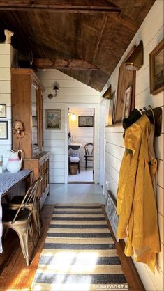 the hallway is clean and ready to be used as a dining room or kitchen area