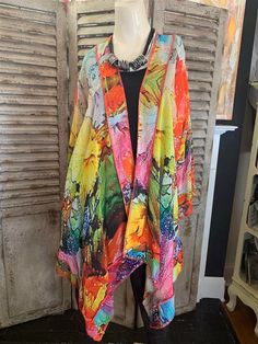 Ink Alcohol Short Butterfly Jacket One Size Fits Most 100% Rayon Dry Clean Only/Hand wash on delicate Made in India Avail: Pink multi MeasurementsLength HPS: (total length from high pt of shoulder to hem) – 28″Chest Circumference: (1″ below armhole) – 40″Sleeve Length: (from center back neck to sleeve hem) – 26″Sleeve Opening: (circ.@ sleeve hem) – 21 1/2″Sweep: (circumference on bottom hem) – 44″Shoulder: (shoulder pt seam to shoulder pt seam across back) – 17 1/2″Armhole Drop – 9 1/2″Neck Widt Multicolor Outerwear With Floral Print And Kimono Sleeves, Multicolor Floral Outerwear With Kimono Sleeves, Long Multicolor Spring Outerwear, One Size Multicolor Floral Print Outerwear, Multicolor Floral Print Outerwear One Size, Multicolor Floral Print One-size Outerwear, Casual Multicolor Wrap Kimono, Multicolor Wrap Outerwear For Spring, Multicolor Wrap Spring Outerwear