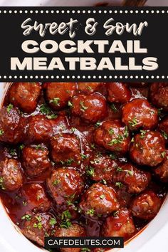 a close up of meatballs in a bowl with sauce and parsley on the side