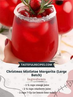 christmas mistlet margarita large batch ingredients in a glass with rosemary sprigs on top