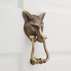 a door handle with a cat's head on it