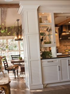 an open kitchen and dining room area in a house