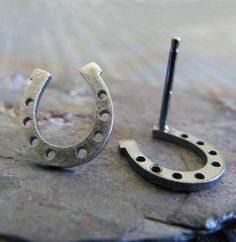 When kept as a talisman, a horseshoe is said to bring good luck. Some believe that to hang it with the ends pointing upwards is good luck as it acts as a storage container of sorts for any good luck that happens to be floating by. Wear these earrings to bring luck your way. The Details ∞ Artisan handmade ∞ Tiny horseshoe studs (approx 9.6mm x 8.5mm) ∞ Choose from sterling silver, 14k gold-filled or solid 14k yellow gold ∞ Pictured in polished, antiqued and oxidized sterling ∞ Earring backs inclu Nickel-free Horseshoe Sterling Silver Jewelry, Nickel-free Silver Horseshoe Jewelry, Artisan Jewelry Handmade, Small Gift Boxes, Gold Filled Earrings, Gold Earring, Antique Earrings, Yellow Gold Earring, Storage Container