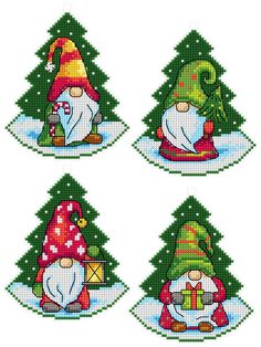 four gnomes are sitting in front of the christmas tree and one is holding a present