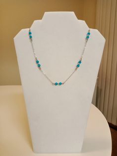 This necklace features sets of three beads. There are two larger beads on the ends with a smaller silver spacer bead in the middle. Each set of beads is connected by chains. There's also a lobster claw clasp. This necklace measures 18 inches but has an extender for 19 inches and 20 inches. If you want a certain length, simply message me because I'm here to work with you! It's made to order so you can choose your own colors for the beads and the chain. Please refer to my photos for your options. Metal Beaded Chain Necklace For Gift, Silver Turquoise Necklace With Round Beads, Silver Turquoise Necklace With Round Beaded Chain, Silver Turquoise Necklace With Spacer Beads For Gift, Adjustable Sterling Silver Necklace With Dangling Beads, Sterling Silver Beaded Necklaces With Round Beads, Silver Adjustable Crystal Necklace With Dangling Beads, Crochet Angel, Crochet Storage