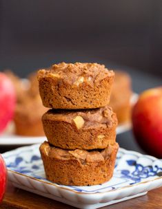 three muffins stacked on top of each other on a blue and white plate