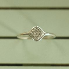 A dainty signet-style ring featuring a raised pattern inspired by mosaic tiles. Perfect for any finger but particularly lovely on a pinky finger. Solid Sterling Silver Pinky Finger Ring Women, Silver Pinky Promise Ring, Pinky Signet Ring Women, Silver Pinkie Ring, Pinky Ring Silver, Pinky Finger Ring, Pinkie Ring, Silver Pinky Ring, Pinky Finger