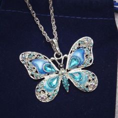 Blue Rhinestone Embellished Blue Butterfly Necklace Blue Crystal Butterfly Necklace, Blue Necklace For Birthday Gift, Cheap Blue Necklace For Birthday Gift, Luxury Blue Butterfly-shaped Jewelry, Luxury Blue Flower Shaped Necklace, Luxury Blue Flower Pendant Jewelry, Luxury Blue Flower Pendant Necklace, Sweater Necklaces, Long Necklaces