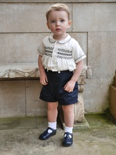 Boys Traditional two-piece navy smocked shirt and short set Smocked Shirt, Smocked Baby Clothes, Rachel Riley, Familia Real, Hand Smock, Joseph Joseph, Kid's Fashion, School Board, Heritage Collection