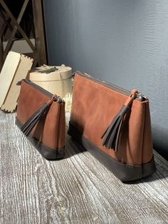 Leather pencil case is a wonderful bridesmaid gift. We can make personalization and put initials or any text you desire to see) There are two sizes of this leather pen pouch Bigger size 22x12x6 cm (8.7x4.7x2.4 inch) Smaller size 18x10x4 cm (7x5x1.6 inch) This leather pencil case has a pocket inside. Can be also used as a makeup bag or toiletry bag. It is made in combination of two colors - cognac brown and dark brown. You can order your own combination and create a unique product, just contact m Brown Zipper Pouch Pencil Case For Personal Use, Leather Pencil Case Pouch For Personal Use, Brown Leather Pencil Case Gift, Leather Cosmetic Bag With Zipper Closure As Gift, Brown Leather Cosmetic Bag With Zipper, Leather Pencil Pouch, Personalised Pencil Case, Leather Pen Case, Leather Zipper Pouch