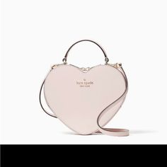 Authentic Brand New Still In Plastic Never Opened Kate Spade Love Shack Heart Shaped Purse. I Just Want To Get As Close As Possible To What I Paid For It! Super Cute! Great For Valentine’s Day! Or Any Date Night Out With Your Sos! 7.48"H X 8.27"W X 2.36"D Handle Drop: 2.5" Strap Drop: 22" Saffiano Pvc Metal Pinmount Logo Two Way Spade Jacquard Lining Interior Front Slip Pocket Zip Around Closure Kate Spade Heart Purse Pink, Kate Spade Heart, Kate Spade Disney, Leopard Bag, Kate Spade Crossbody Purse, Heart Bag, Kate Spade Wallet, Kate Spade Purse, Leather Crossbody Purse