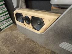 the inside of a car with speakers in it