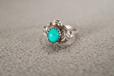 I am offering you this vintage sterling silver wedding band stacker design ring.  This features a raised relief  single stone setting.  This has a prong set oval shaped genuine Turquoise stone set in it.  This ring is currently a size 4, though I am sure it could be sized up or down. Please review all of my pictures, as they are all a very important part of , my listing/descriptions. Vintage Stackable Jewelry With Round Band, Silver Stackable Turquoise Ring For Anniversary, Silver Sterling Silver Turquoise Wedding Ring, Vintage Turquoise Promise Ring, Turquoise Vintage Promise Ring, Wedding Stackable Turquoise Ring In Sterling Silver, Sterling Silver Stackable Turquoise Ring For Wedding, Silver Turquoise Wedding Ring With Gemstone, Stackable Sterling Silver Turquoise Ring For Wedding