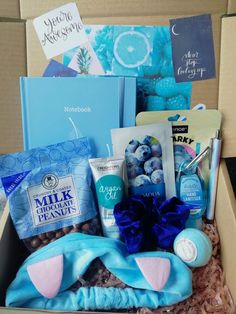 a box filled with lots of goodies for someone's special occasion or birthday