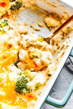 a casserole dish with broccoli and cheese