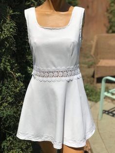 Here is a vintage 1970s polyester tennis dress.Made by Court One.Size 15-16.Following are the measurements. Bust 34", waist 28",Hips full,Length 31".Zips up the back.Open lace waistband.Fancy stitching on hemline.In nice vintage condition.Please take special consideration of measurements. 1970s sizing was very small to today's standards. Tennis dresses were very short not like a regular dress. So please take special note of length. If you live overseas please email me first before purchasing for mailing cost. Price quoted is for USA only Chic A-line Tennis Dress For Spring, Elegant Stretch Tennis Dress For Spring, Elegant Spring Tennis Dress With Stretch, Sleeveless Retro Vintage Dress With Lace Trim, Casual Fitted Sleeveless Vintage Dress, Retro Sleeveless Vintage Dress With Lace Trim, Fitted White Vintage Dress For Spring, Fitted Cotton Mini Tennis Dress, Sleeveless Fit And Flare Tennis Dress For Summer