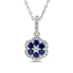 Color and sparkle blossom in this delightful necklace. A captivating cluster of blue lab-created sapphires blooms from the center of the floral-inspired silhouette. Bright white lab-created sapphires form a beautiful surround adding extra shimmer and shine. Fashioned in stylish sterling silver, the pendant suspends from an 18-inch cable chain secures with a lobster clasp. Fine Jewelry Blue Necklace With Flower Pendant, Fine Jewelry Blue Flower Pendant Necklace, Blue Flower Pendant Fine Jewelry Necklace, Elegant Blue Flower Pendant Necklace, Elegant Blue Flower Necklace, White Lab, Shimmer And Shine, Kay Jewelers, Shimmer N Shine