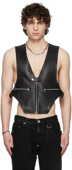 Sleeveless grained leather vest in black. · Zip closure · Zip pockets at waist · Adjustable straps at sides · Fully lined · Silver-tone hardware Supplier color: Black Punk Style Sleeveless Leather Vest, Biker Style Sleeveless Vest With Zipper Closure, Sleeveless Biker Vest With Zipper Closure, Black Leather Sleeveless Vest, Sleeveless Leather Work Vest, Black Leather Vest, Leather Vest, Luxury Streetwear, Designer Fashion