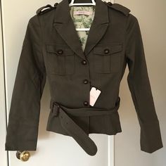 Gorgeous Military-Style Trench Jacket By Red Valentino. Size 46 (It Might Be The Equivalent Of A Size Medium In The U.S.) Made In Italy 97% Cotton, 3% Elastane Color Is A Dark Olive Green Notched Lapel 2-Inch Belt Decorative Military Loops On Shoulders Beautiful Floral Print Interior Lining Measurements (Approximate & Lying Flat): Shoulders (Seam To Seam): 16” Bust (Armpit To Armpit): 15” Waist: 15” Hips: 15” Length: 23.5” Sleeve Length: 24” Cuff: 5” From A Smoke-Free & Pet-Free Home. Fitted Utility Jacket With Flap Pockets And Collared Shape, Fitted Collared Utility Jacket With Flap Pockets, Fitted Winter Utility Jacket With Flap Pockets, Fall Military Style Single Breasted Blazer, Military Style Blazer With Flap Pockets For Work, Military Blazer With Lapel Collar For Fall, Military Style Single Breasted Blazer For Fall, Military Style Blazer With Lapel Collar For Fall, Fitted Utility Jacket For Workwear In Fall