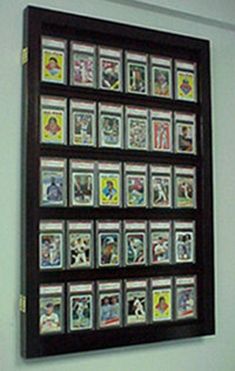 a display case with many different baseball cards on it