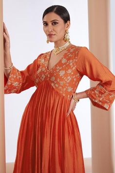 Orange floral embroidered anarkali featuring dori, sequin, and zari work. Paired with matching pant and dupatta., Fit: Relaxed Luxury Orange Anarkali Set With Resham Embroidery, Luxury Silk Thread Anarkali Set For Navratri, Luxury Cotton Anarkali Set For Diwali, Luxury Orange Anarkali Kurta, Luxury Semi-stitched Orange Anarkali Set, Luxury Orange Anarkali Set For Diwali, Affordable Orange Traditional Wear For Puja, Luxury Designer Orange Churidar, Luxury Orange Anarkali Set