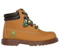 Get ready for outdoor adventures wearing Skechers x John Deere: Bowland - Rugged-Dozer! This lace-up boot features a synthetic upper with a John Deere tractor charm, second set of laces, and a cushioned Skechers Air-Cooled Memory Foam insole. For youngsters dreaming of driving a tractor someday, Skechers x John Deere for kids has arrived. Your little one can 'work' alongside you in total comfort thanks to these fun mini-you styles. | Skechers Boy's John Deere: Power Reach - Rugged-Dozer Boots | Kids Hunting, Hiking Men, Womens Safety, Western Women, Athletic Men, Wide Shoes, Hiking Women, Athletic Women, Leather Care