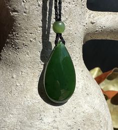 Canadian Nephrite Jade Teardrop PendantMeasures approximately 17 x 32 x 9mm on an adjustable wax cord. The cord adjusts up to 26."Comes with or without our handcrafted wooden gift box Jade Charm, Jade West, Wood Gift Box, 15 Gifts, Wooden Gift Boxes, Jade Bangle, Jade Earrings, Nephrite Jade, Jade Ring