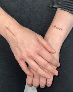 Dagger and script tattoo gothic font chaotic wrist Crest Tattoo Ideas, Vertical Words Tattoo, Small Tattoos Sagittarius, Small Dagger Tattoo Simple, Fine Line Dagger Tattoo, Dagger Hand Tattoo, Dainty Dagger Tattoo, Tiny Dagger Tattoo, Dagger Finger Tattoo