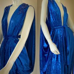 Handmade in our small exclusive studio in Portland Oregon. Indulge in the timeless elegance of our exquisite draped velvet Grecian gown, crafted from luxurious materials for a regal and goddess-like look.  The flowing design features intricate draping and a body-flattering silhouette, perfect for any formal occasion.  The soft rich crushed velvet  in a vibrant royal blue adds a touch of sophistication and luxury, while the Grecian-inspired details bring a touch of ancient glamour. Spectacular sparkling rhinestone appliqués on shoulders bring the bling for a one of a kind look!  This versatile gown can be worn in a number of different ways from a modest look to a more daring evening style. Pair with the matching turban, statement jewelry and heels for a look that's both dramatic and allurin Luxury Velvet Wedding Dress, Fitted Velvet Dress With Traditional Drape, Celtic Dresses, Grecian Gown, Celtic Dress, Velvet Evening Gown, Goddess Gown, Feminine Wardrobe, Grecian Goddess