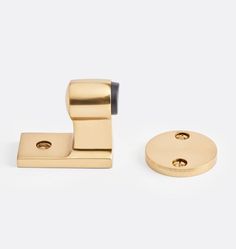 brass plated door handles and knobs on a white background