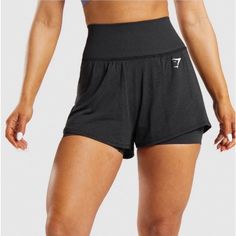 Comfortable And Stylish Black High-Waisted Athletic Shorts Perfect For Workouts. Made By Gymshark. 1 Pair Of Shorts. 2 Layers. All The Possibilities. The Vital Seamless 2.0 2-In-1 Shorts Feature An Inner Layer Made From The Classic Seamless, Sweat-Wicking Fabric In The Rest Of The Vital Seamless Collection. Then, We've Added An Extra Layer Made From A Brand New, Lightweight Fabric For Better Breathability In Those High Sweat Sessions. And, Thanks To The Looser Fit Of The Outer Layer, You Get A L Gymshark Shorts, Gymshark Vital Seamless, Gymshark Black, Gymshark Women, Cycling Shorts, Gym Shorts, Sweat Shorts, High Rise Shorts, Shorts With Tights