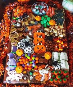 a tray filled with lots of halloween treats