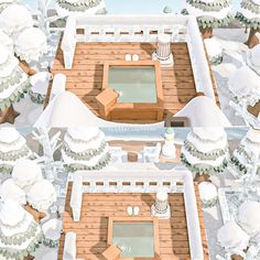 an aerial view of a snow covered deck and hot tub