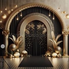 an image of a stage set up for a party with gold decorations and balls on the floor