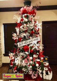 a christmas tree decorated with red and white ornaments