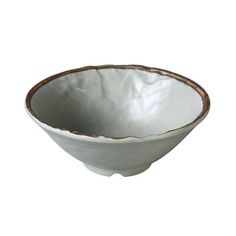 a white bowl with brown trim on the rim is shown in front of a white background