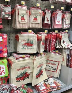 christmas bags are on display in a store