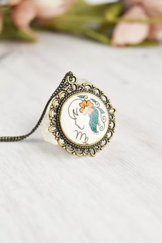 Your zodiac witchy necklace collection is not complete without a Virgo necklace maiden sign. Handmade with whimsical, cute miniature art and a vintage style, this Virgo pendant ignites your inner magic. The Virgo jewelry is painted by hand, making each piece unique and one of a kind, just like you. Click through to see more glass pendant necklaces! Virgo Jewelry, Virgo Pendant, Virgo Necklace