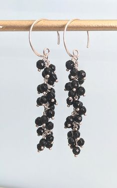 Sterling Silver and Black Onyx Dangle Cluster Earrings, Long Cascade Sterling Silver Hoop Earrings. The earrings measure 2 1/2" ( 63 mm.)long. * Processing time is 3 - 5 days.  * US orders are shipped first class mail. * International orders are shipped first class international. * Shipping upgrades are available at checkout. Thank you for visiting my listing! Have a wonderful day! Black Dangle Hoop Earrings For Party, Black Dangle Earrings With Ear Wire, Black Drop Earrings With Dangling Beads, Black Long Drop Earrings With Dangling Beads, Black Dangle Linear Earrings For Pierced Ears, Black Sterling Silver Dangle Crystal Earrings, Nickel-free Black Long Drop Earrings, Nickel Free Black Long Drop Earrings, Black Dangle Linear Earrings