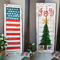 two wooden shutters decorated with american flags and the words fo9 painted on them