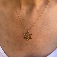 "A beautiful Star of David necklace comes in a unisex design. The chain is goldfield and the Star of David is Gold plated with high-quality 2-micron gold. Great as a gift for a Bar mitzvah or Bat mitzvah, birthday, or holiday. This piece of jewelry comes wrapped in a nice package and is ready to be given as a gift. ❤ 𝗠𝗘𝗔𝗦𝗨𝗥𝗘𝗠𝗘𝗡𝗧𝗦 ❤ Pendant width:0.91\"/2.31 cm. Pendant length: 0.91'/2.31 cm. Please choose your length from the drop-down list. ❤ 𝗠𝗬 𝗦𝗧𝗢𝗥𝗘 ❤ For more pendant neckl Gold Plated Star-shaped Necklaces, Gold Plated Star Necklaces, Star Of David Tarnish Resistant Necklace Gift, Gold Star Of David Charm Necklace As Gift, Gold Star Of David Charm Necklace For Gift, Gold Star Of David Jewelry Gift, Gold Star Of David Necklace Gift, Gold Star Of David Necklace For Gift, Yellow Gold Star Of David Charm Necklace Gift