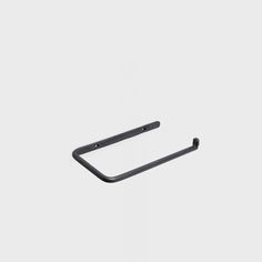 a pair of black metal brackets on a white background