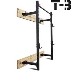 the t - 3 squat station is made from wood and has two bars attached to it