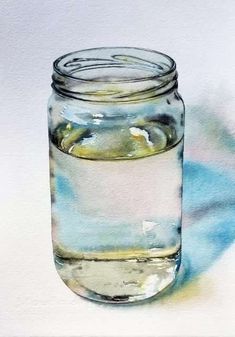 a jar filled with water sitting on top of a table